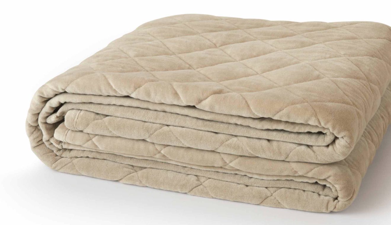 Product page photo of the Saatva Organic Weighted Blanket