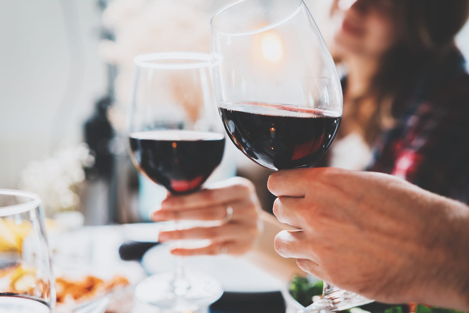 Couple toasting wine glasses