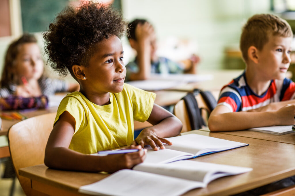 School kids paying attention in the classroom.