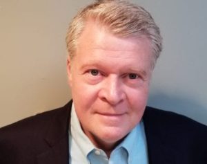 Headshot of author Tom Ryan