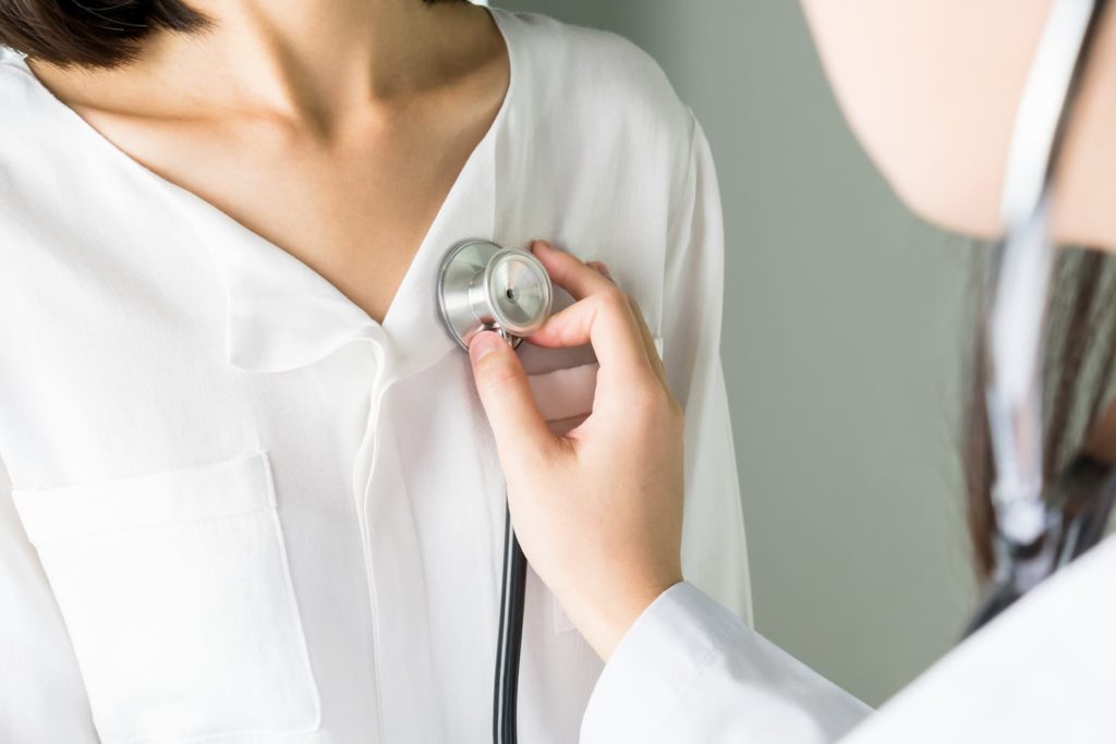 How Does Sleep Apnea Affect the Heart? woman at the doctor