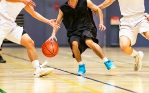 boys playing basketball