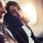 woman sleeping on a plane