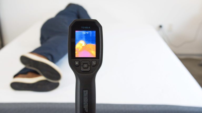 Sleep Foundation testing a Puffy mattress for heat retention with a thermal camera