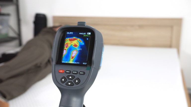 Sleep Foundation testing a Nolah mattress for heat retention with a thermal camera