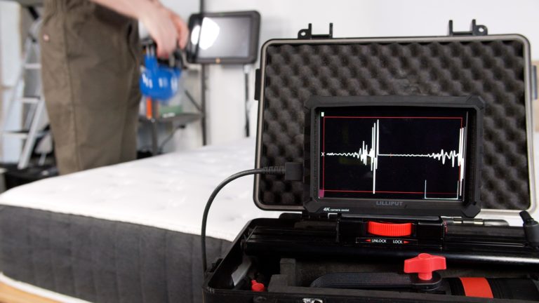 Sleep Foundation testing an Allswell mattress for motion isolation with a kettlebell