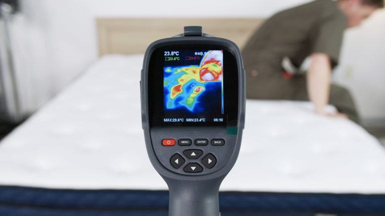 Sleep Foundation testing the Silk & Snow Hybrid mattress for heat retention with a thermal camera