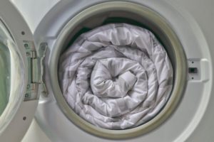 A blanket inside of a washing machine