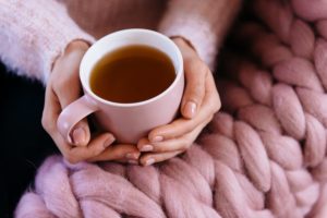 Woman holding a cup of tea