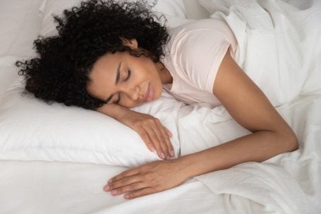 Woman in bed sleeping