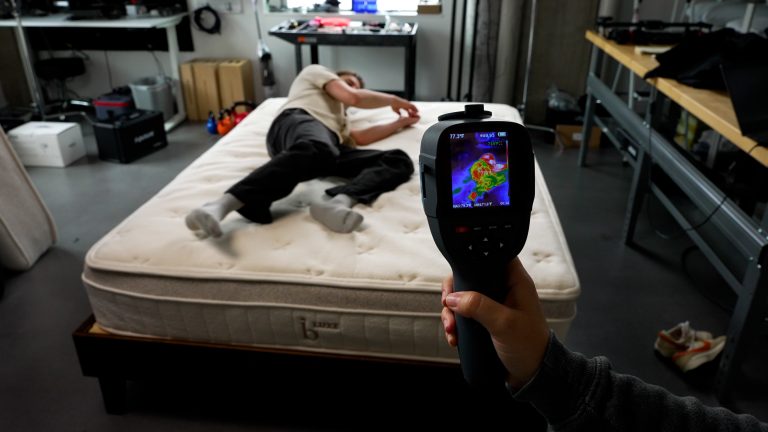 Sleep Foundation tester evaluating the Birch Luxe Natural Mattress