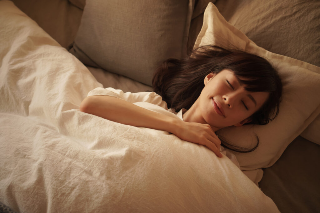 A young woman enjoys a restful sleep