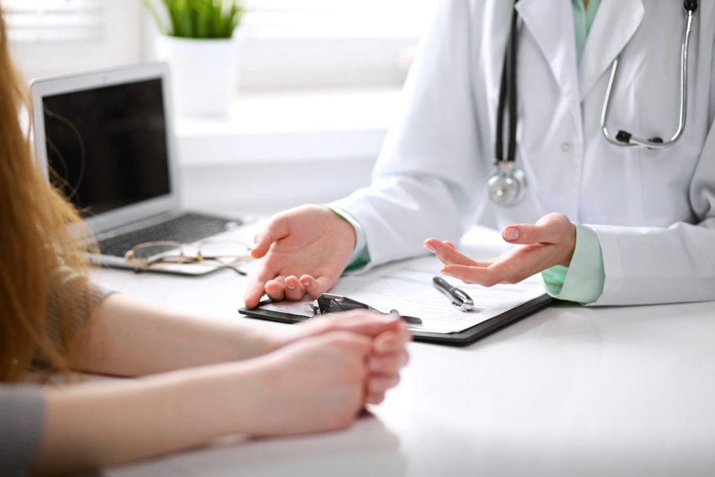 doctor talking to a patient