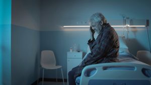 stock photo of a man experiencing insomnia in a hospital