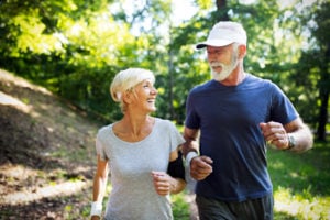 stock photo of an older couple power walking