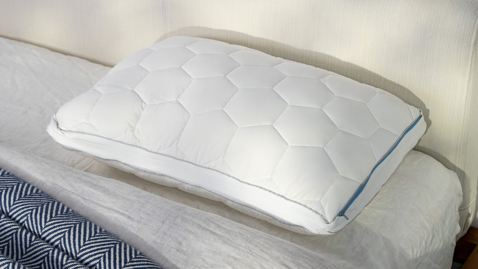 A picture of the SHEEX Original Performance Down Alternative Side Sleeper Pillow in Sleep Foundation's test lab.