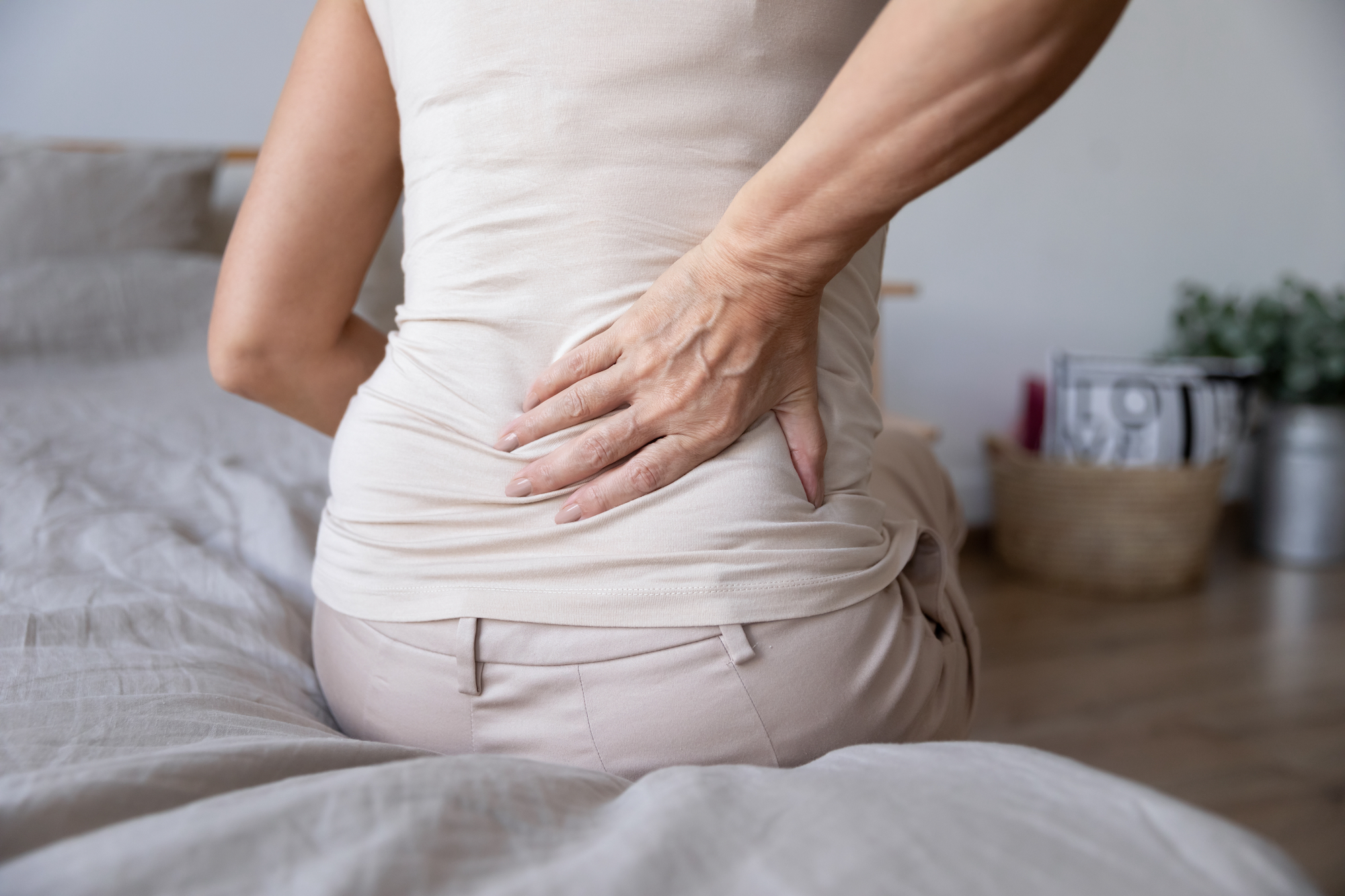 Sciatica Symptoms Including Back Pain and Leg Cramps