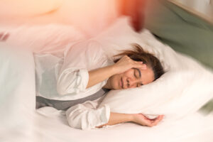 woman experiences vertigo while sleeping