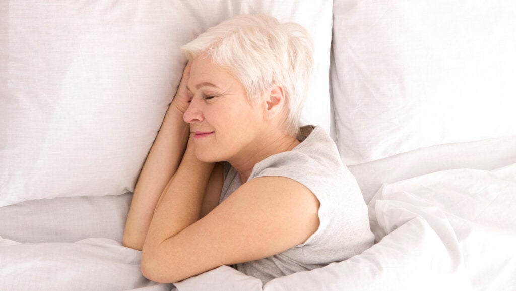 older woman enjoying good sleep