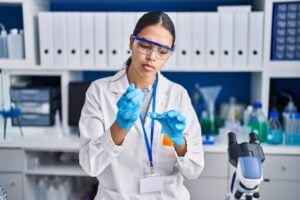 scientist evaluating medication